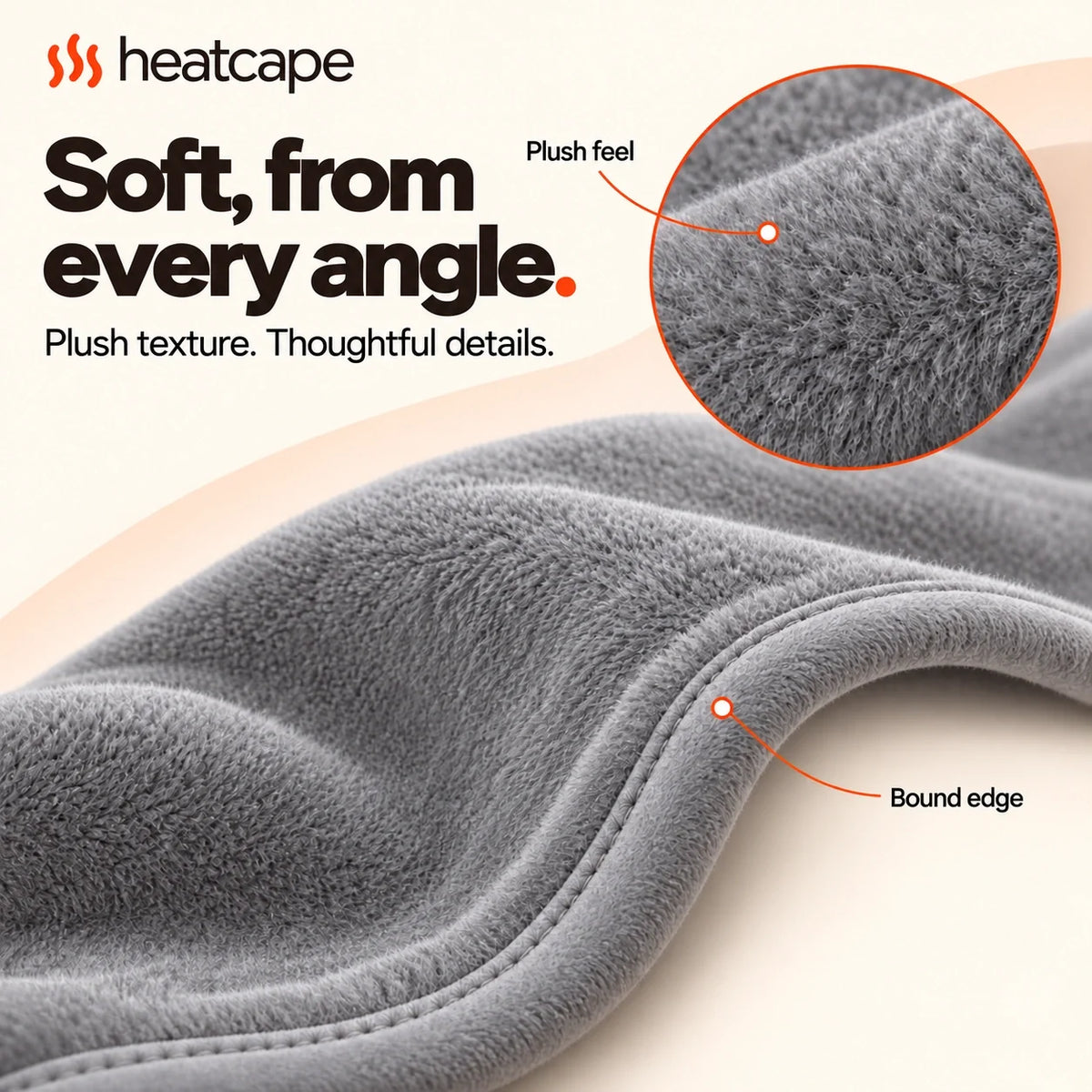 Macro view of the plush gray Heatcape textile and its bound edge.