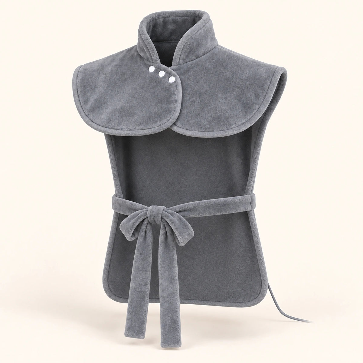 Front view of the gray Heatcape wrap: upright collar with three white snaps, open sides and a narrow front tie.