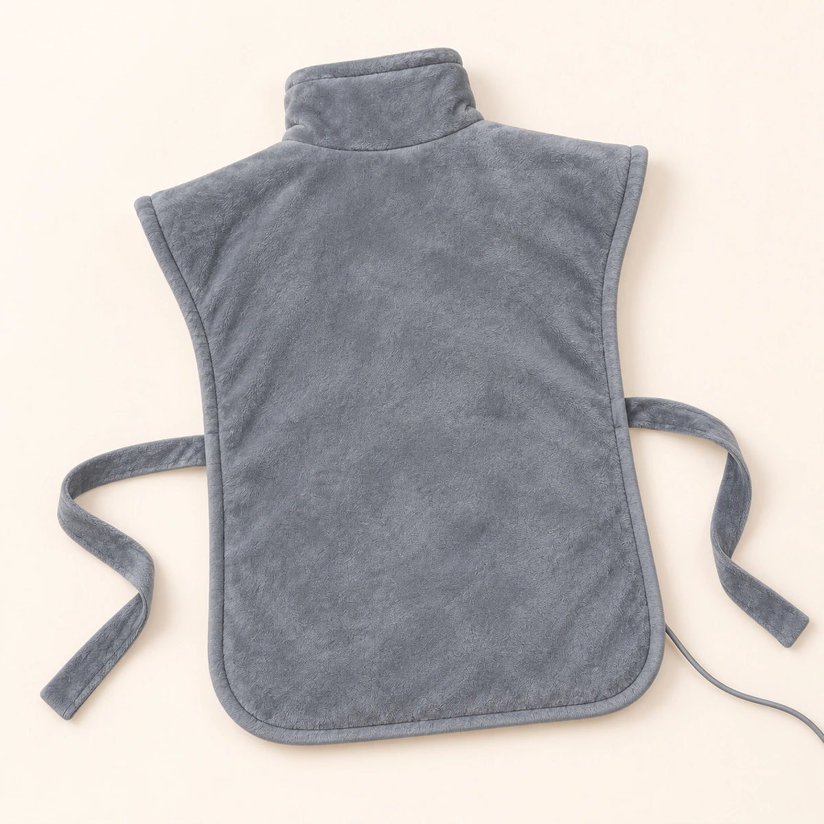 The wrap laid flat from behind, showing the broad continuous rear panel with rounded lower corners.